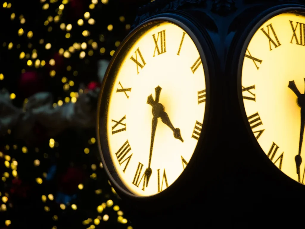 clocks on building with christmas background