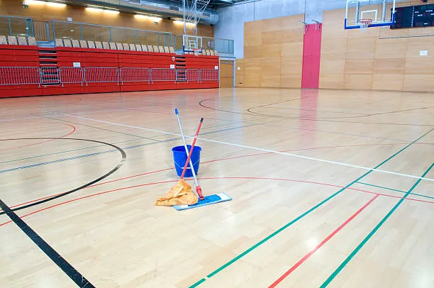 mop and dust broom cleaned school basketball court